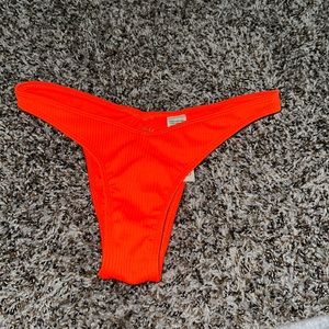 Bright orange bikini thong bottom